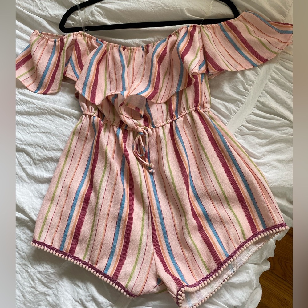 This cute colorful romper in a size kids extra large from Vintage Havana.